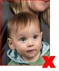 An example of a passport photo of a child where a parent is also visible in the photo